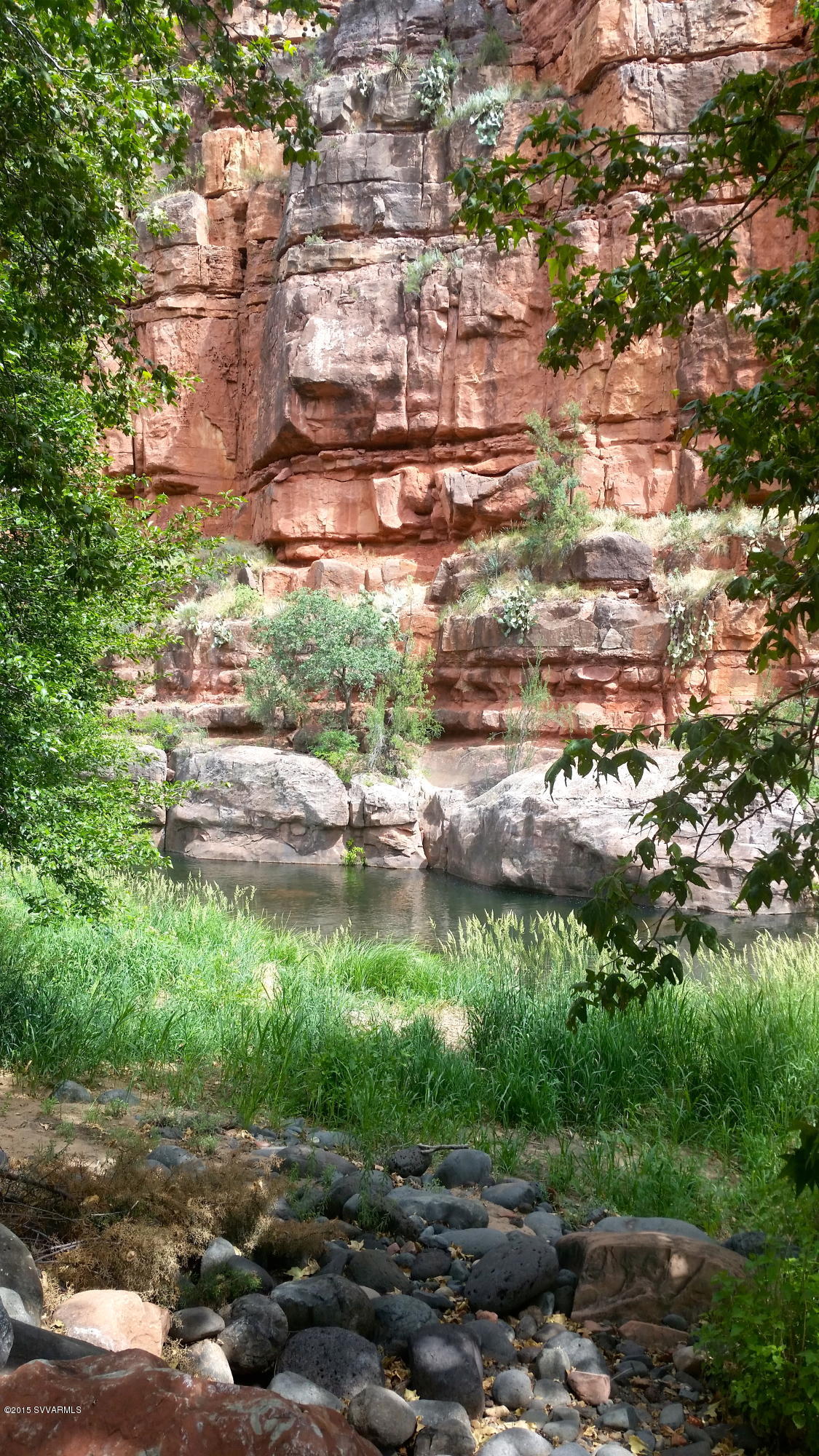 690-950 North State Rte 89A Sedona, AZ 86336 - Photo 25 of 31 a backyard of a house with a yard and lake view