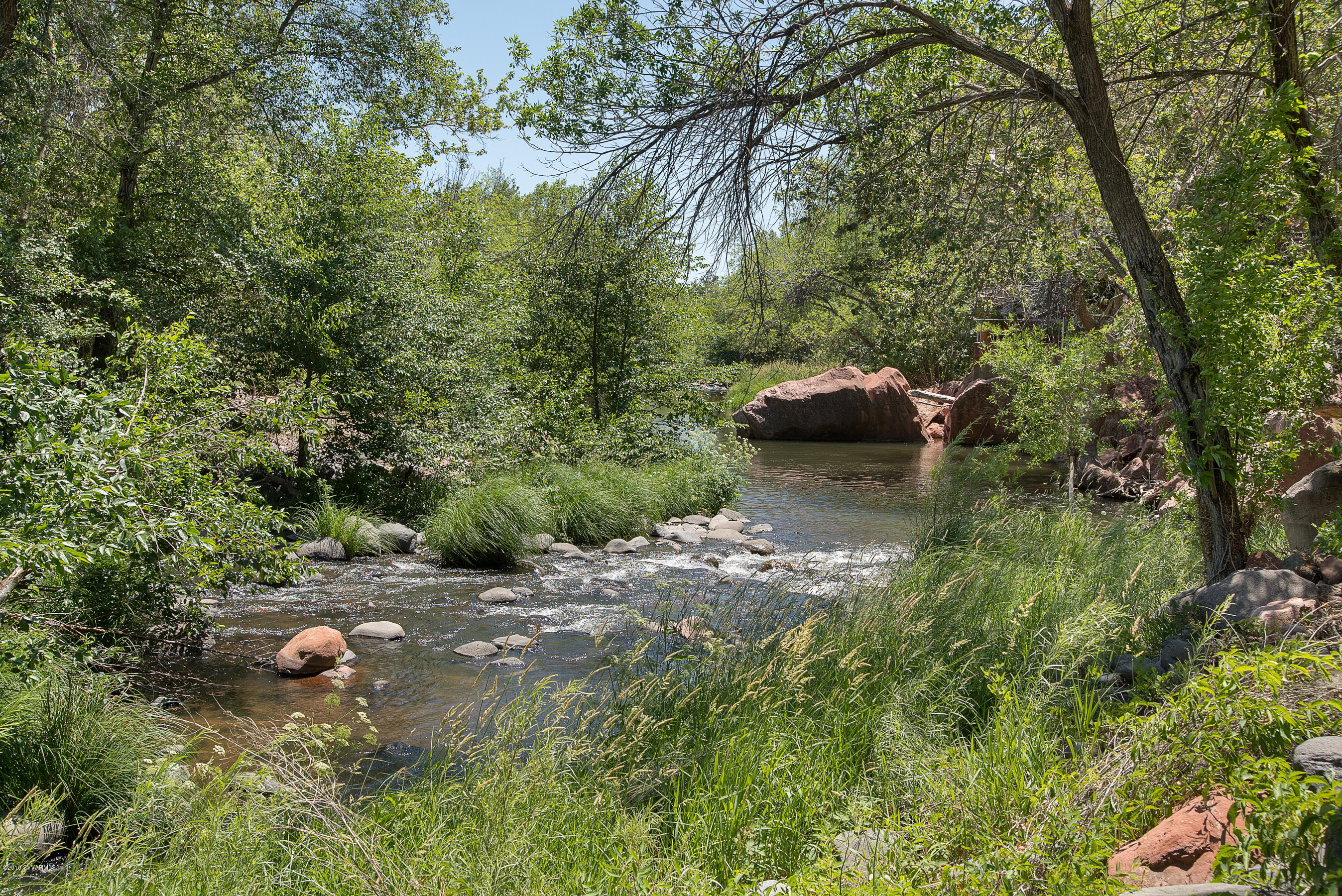 690-950 North State Rte 89A Sedona, AZ 86336 - Photo 5 of 31 a backyard of a house with lots of green space