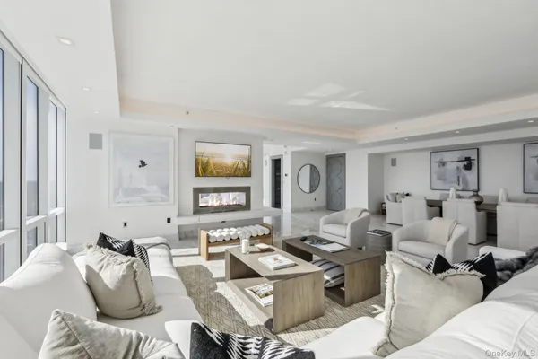 a living room with furniture or couch and a window
