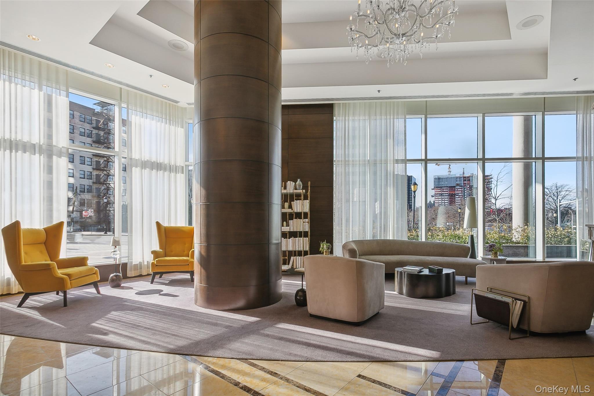 5 Renaissance Square, Unit PH41 ENT White Plains, NY 10601 - Photo 37 of 39 a living room with furniture and large windows