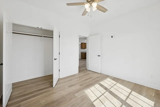 a white bath tub sitting next to a window