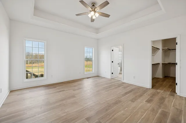 a view of a porch with wooden floor
