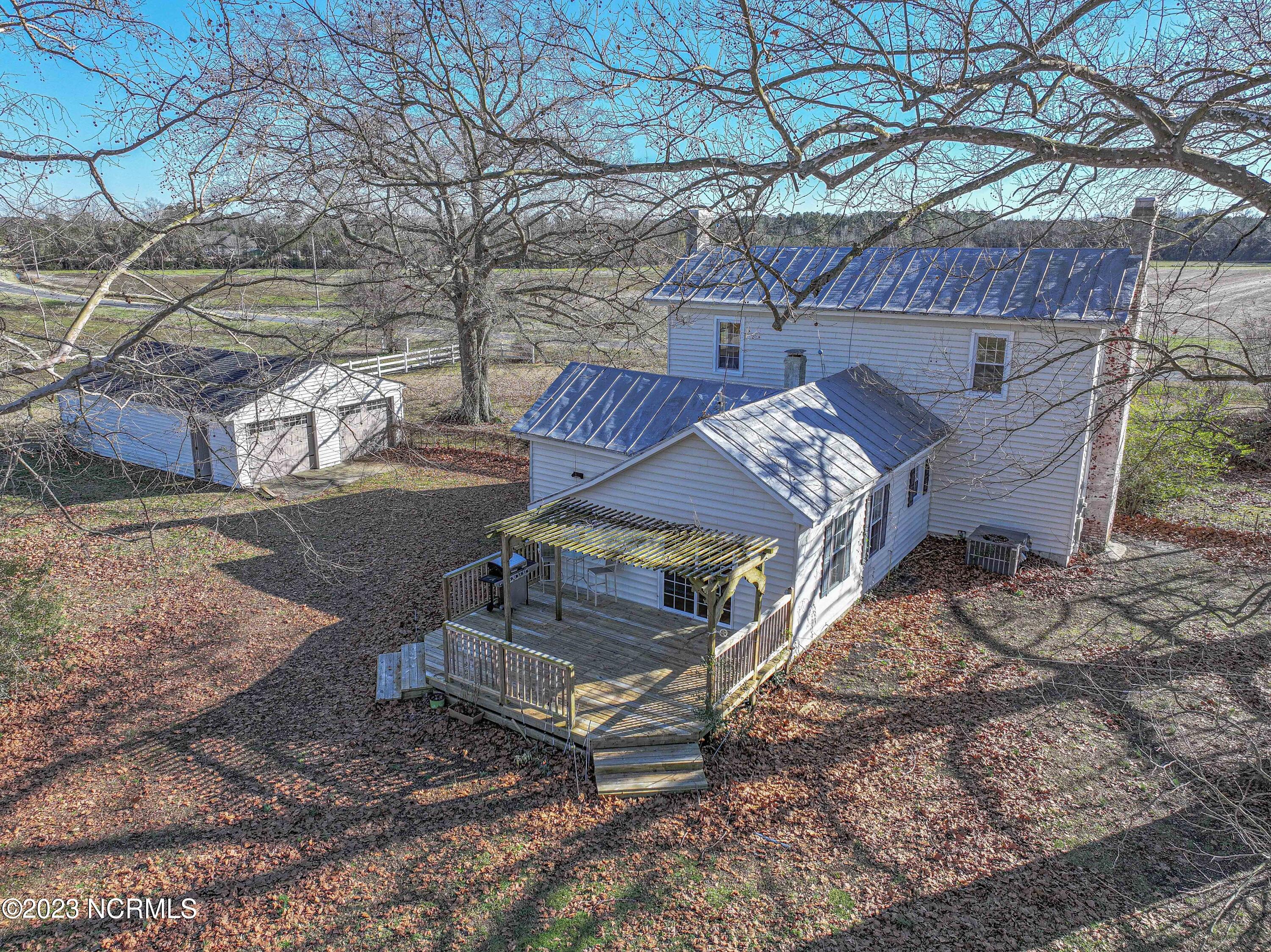 1713 Worthington-Warren Road Stokes, NC 27884 - Photo 10 of 42 Rear Deck & 4 Car Drive Through Garage