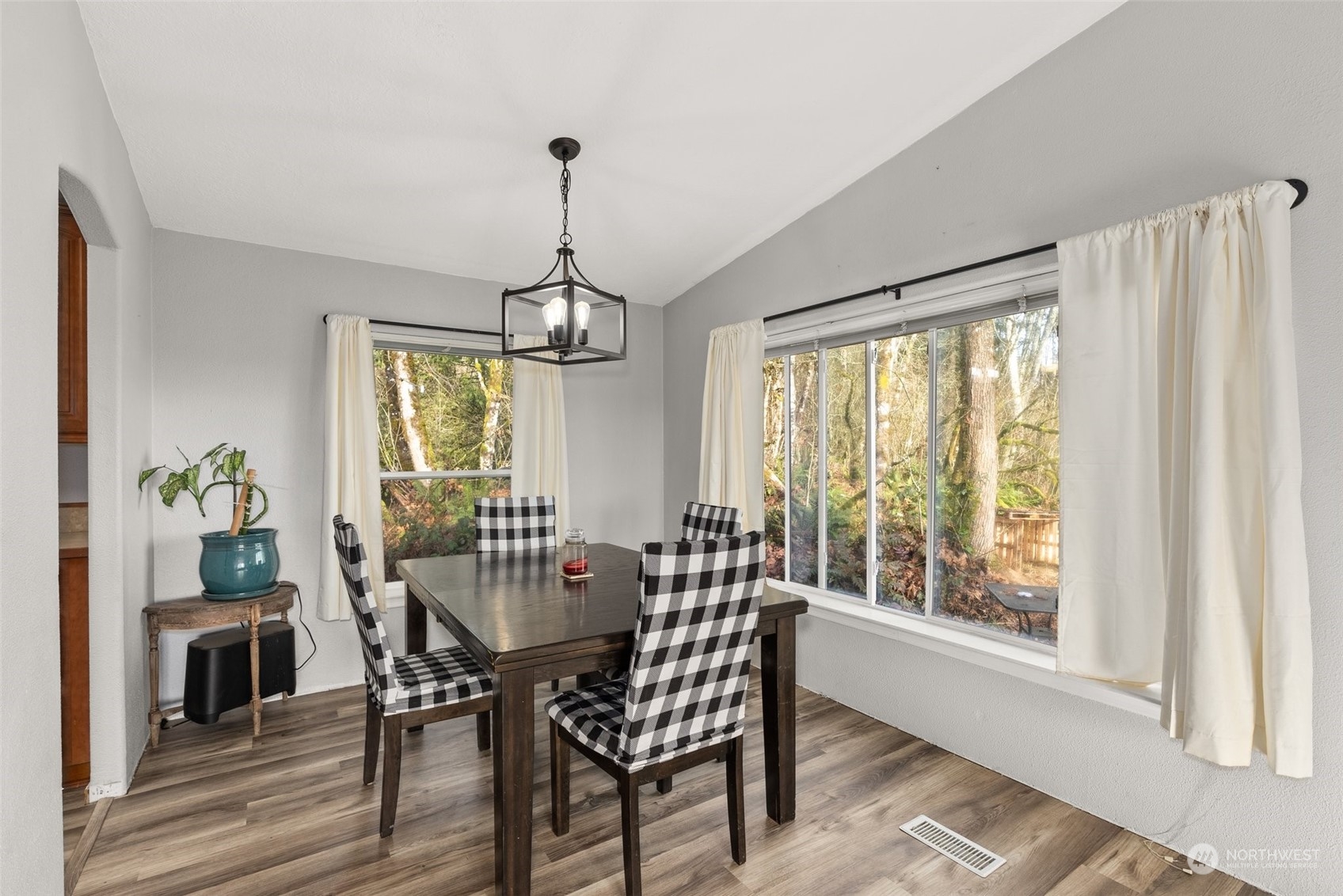 9724 Gate Road Southwest Olympia, WA 98512 - Photo 6 of 34 a view of a dining room with furniture window and outside view