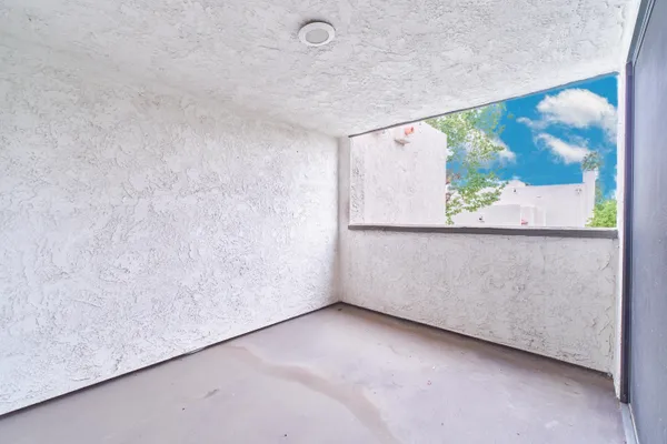 a view of yard from deck having patio