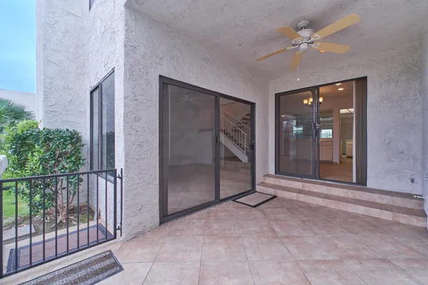 a view of a bathroom with a bathtub and shower