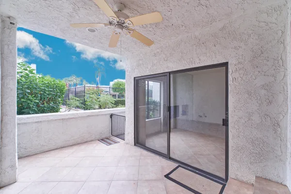 a view of an empty room with stairs