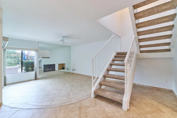 a view of bathroom with a washer and dryer