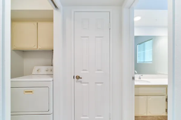 a view of an empty room with a window