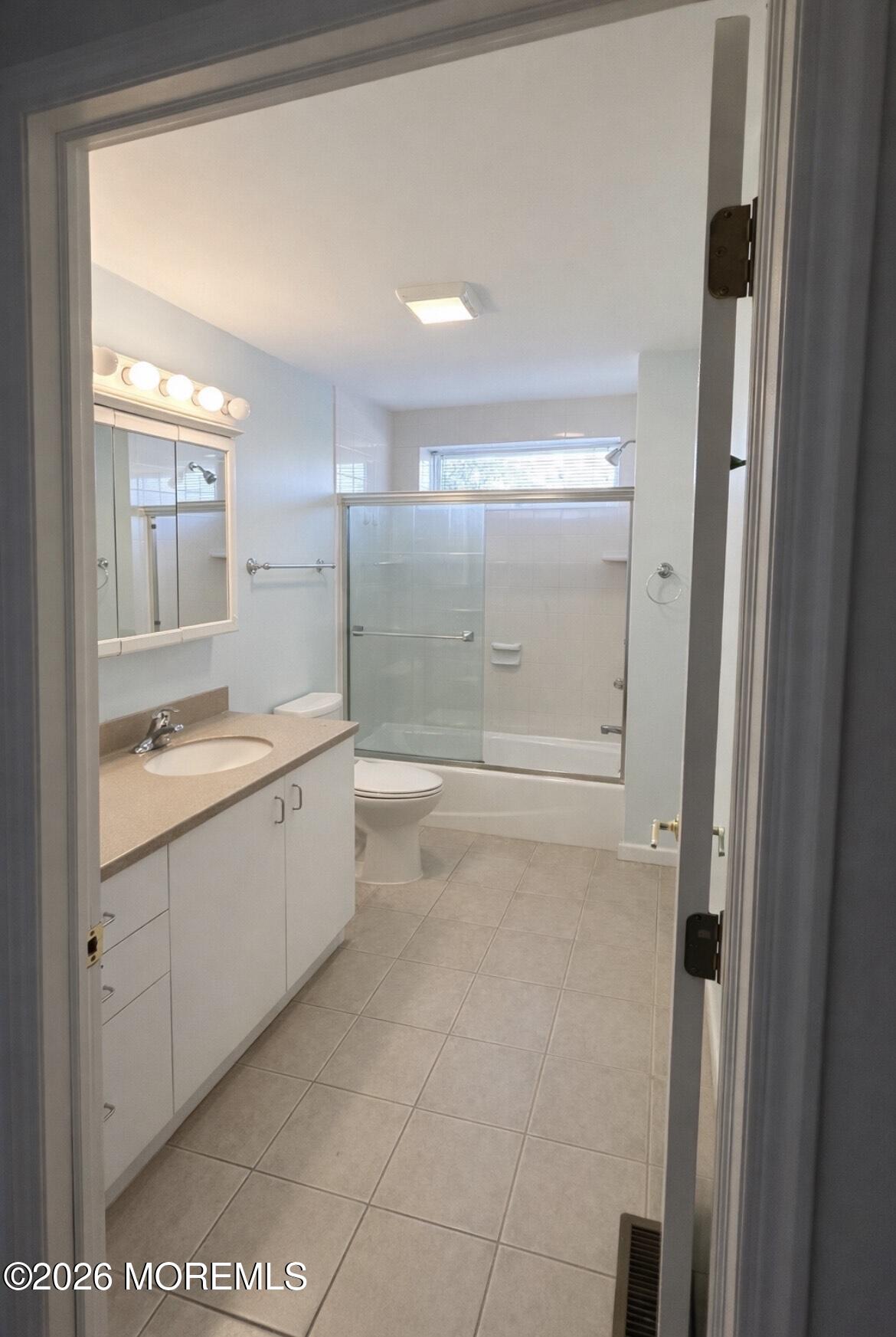 101 Main Street Farmingdale, NJ 07727 - Photo 11 of 12 a bathroom with a granite countertop sink mirror and a