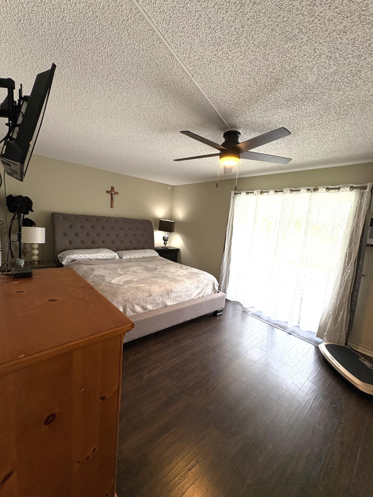 65 Preston F Boca Raton, FL 33434 - Photo 14 of 22 a bathroom with a granite countertop sink and a mirror