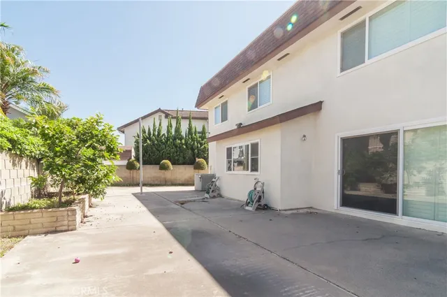 a view of a house with a street