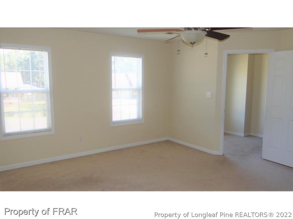 209 Pecan Trace Road Raeford, NC 28376 - Photo 17 of 31 a open hall with a window
