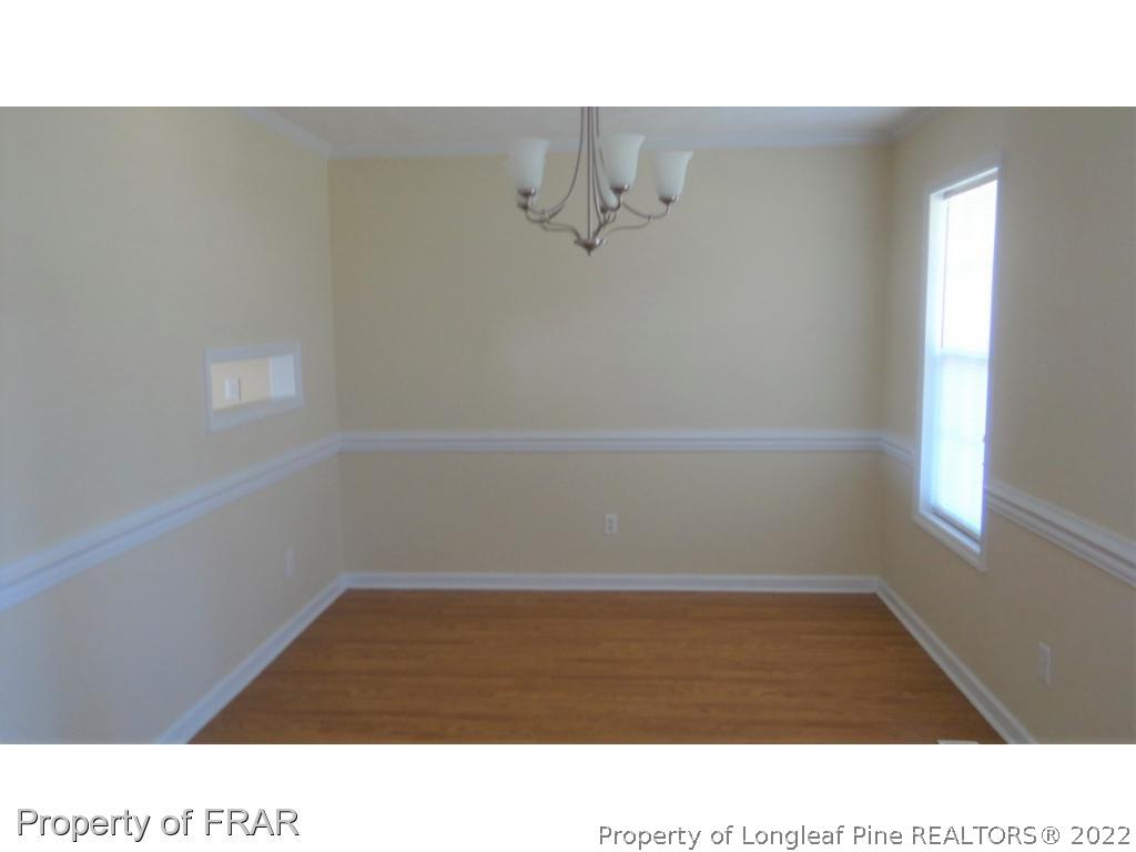 209 Pecan Trace Road Raeford, NC 28376 - Photo 8 of 31 a bathroom with a shower