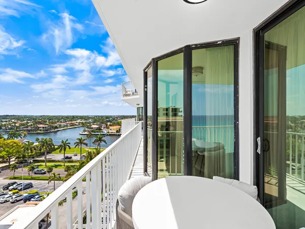a balcony with a city view
