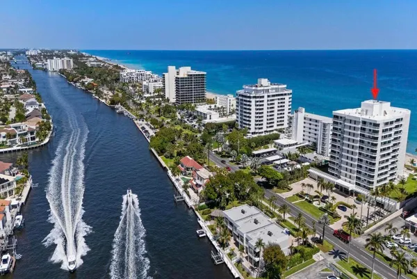 a view of a swimming pool with a yard