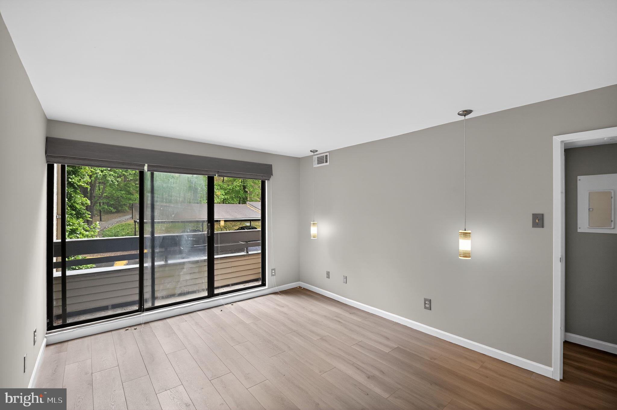 2114 Green Watch Way, Unit 10/201E Reston, VA 20191 - Photo 17 of 31 Large windows throughout