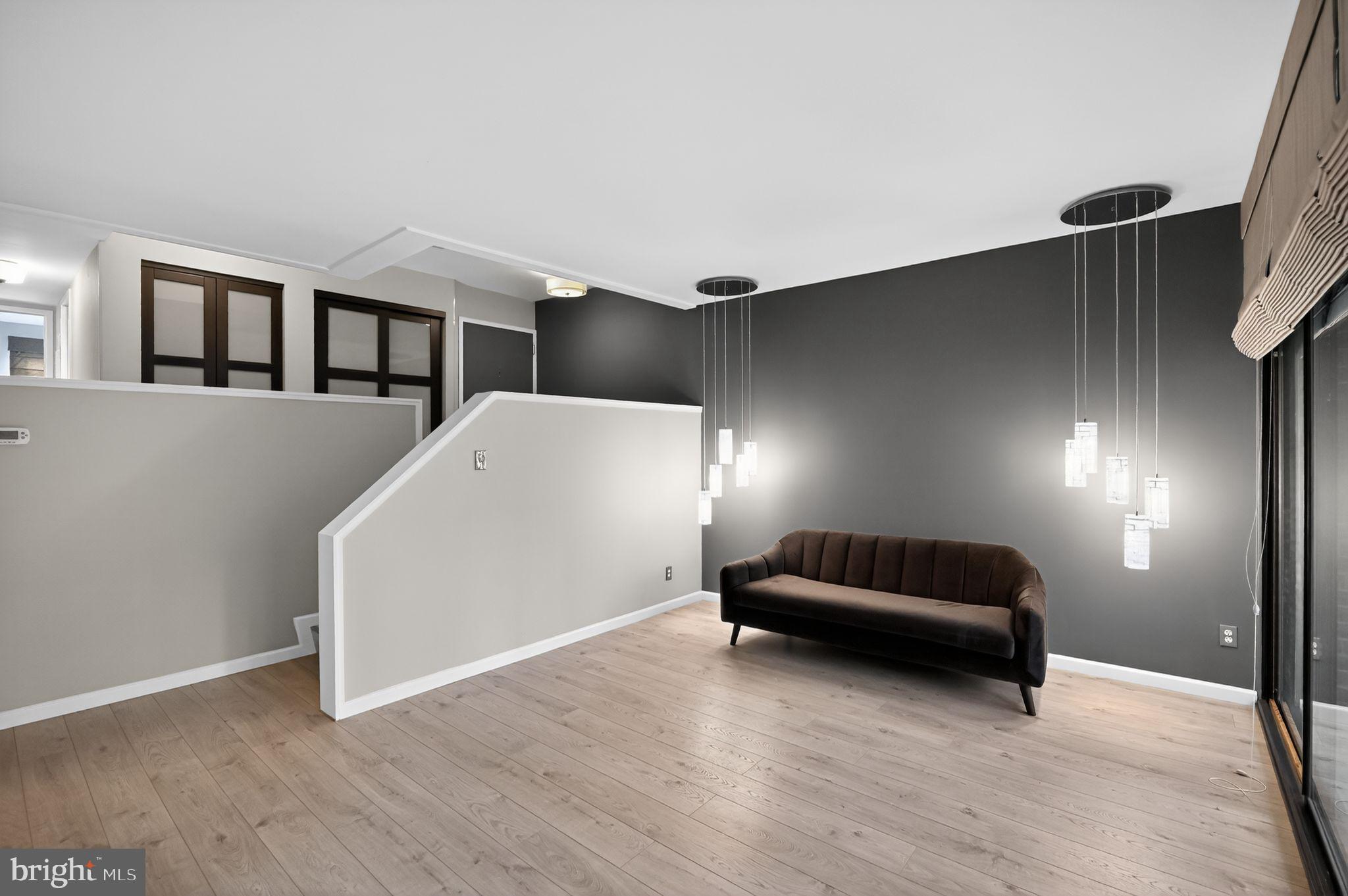 2114 Green Watch Way, Unit 10/201E Reston, VA 20191 - Photo 9 of 31 Spacious and open family room