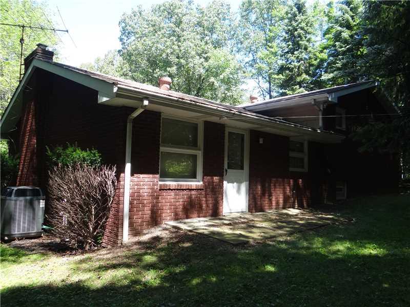 250 Ashbaugh Road Jeannette, PA 15644 - Photo 13 of 15 Exterior Back. lots of shade for those hot days