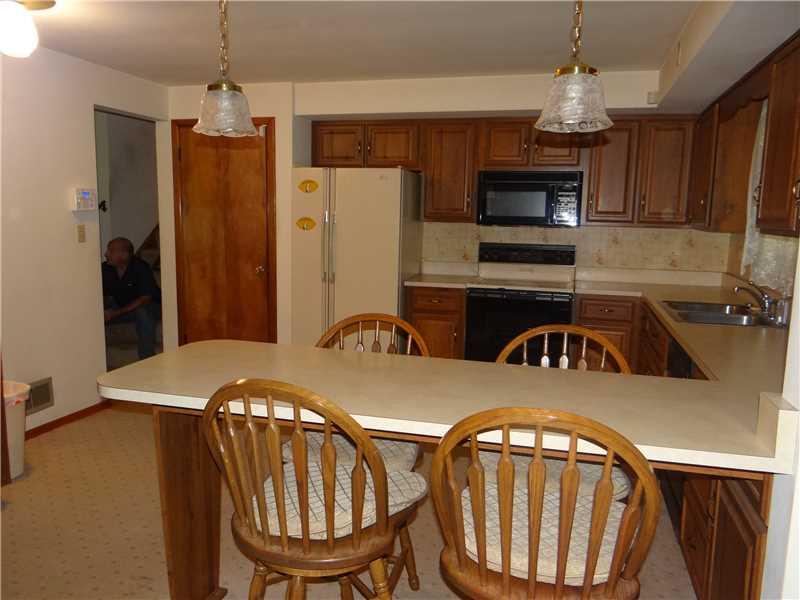 250 Ashbaugh Road Jeannette, PA 15644 - Photo 5 of 15 Kitchen. very bright even without the lighting