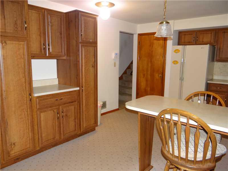 250 Ashbaugh Road Jeannette, PA 15644 - Photo 6 of 15 Kitchen. extra large pantry area and work surface