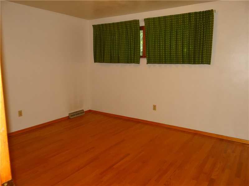 250 Ashbaugh Road Jeannette, PA 15644 - Photo 8 of 15 Bedroom. 15 x 10 bedroom check out the hardwood floors