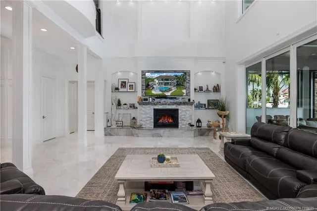 a kitchen with a sink and large window