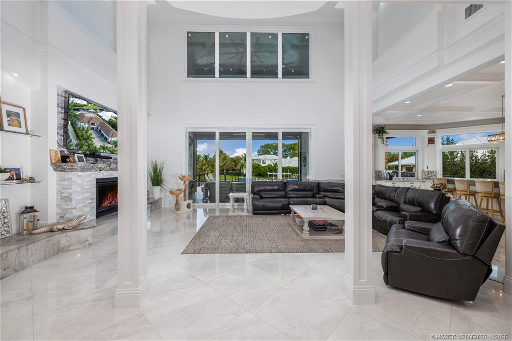 2346 Northwest Fork Road Stuart, FL 34994 - Photo 15 of 100 a living room with furniture and a window