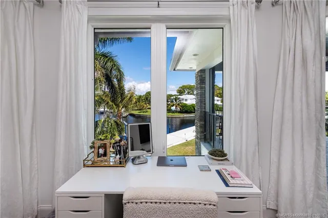 a view of a swimming pool with a patio