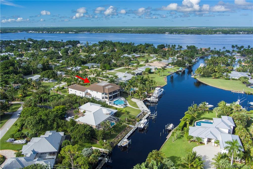 2346 Northwest Fork Road Stuart, FL 34994 - Photo 68 of 100 an aerial view of a house with a yard