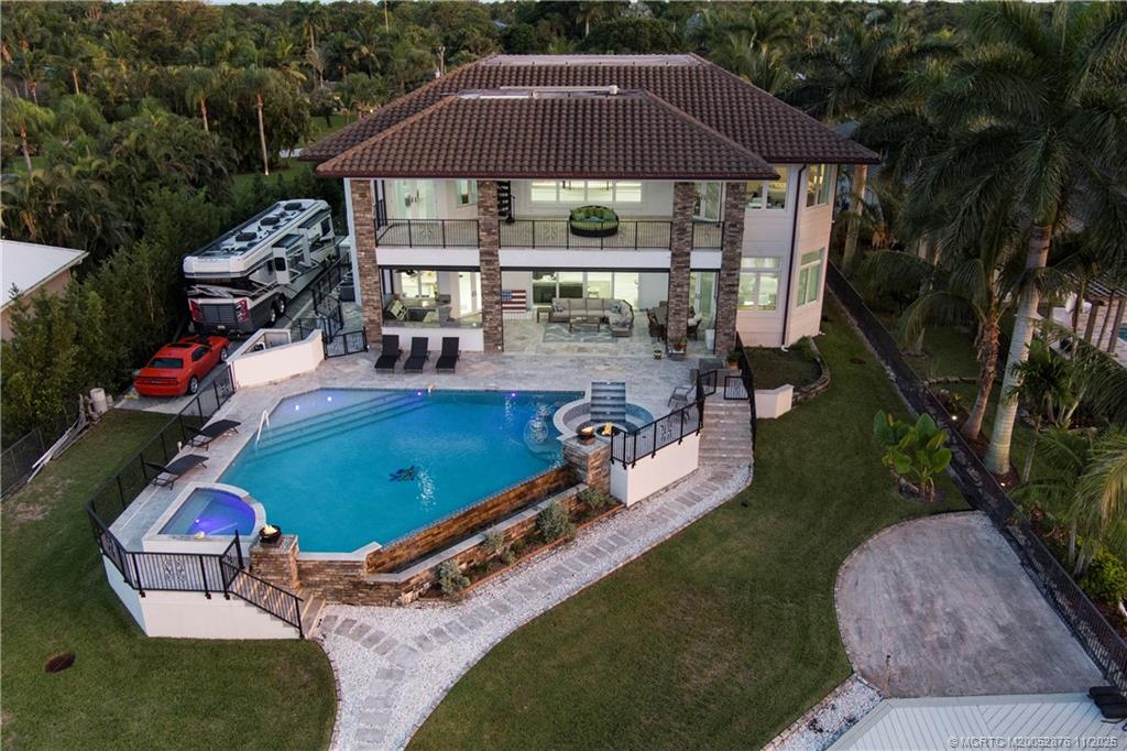 2346 Northwest Fork Road Stuart, FL 34994 - Photo 79 of 100 an aerial view of a house
