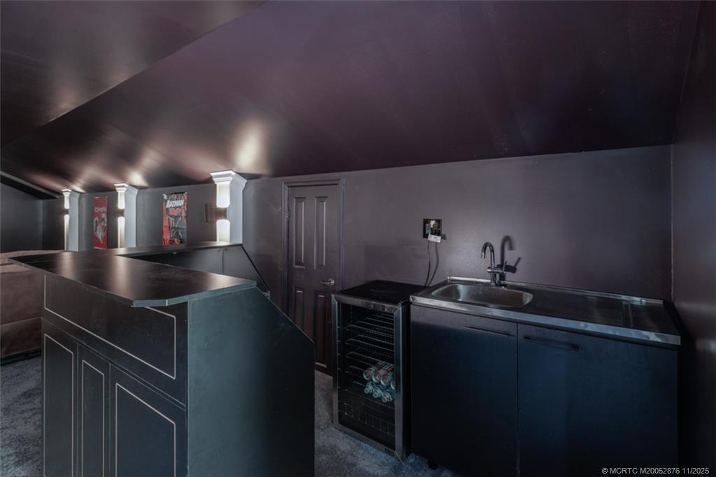 2346 Northwest Fork Road Stuart, FL 34994 - Photo 97 of 100 a kitchen with refrigerator and sink