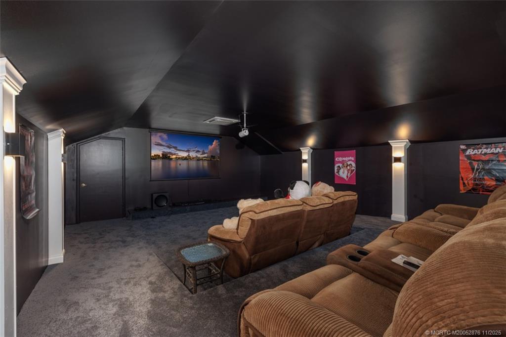 2346 Northwest Fork Road Stuart, FL 34994 - Photo 98 of 100 a living room with furniture and a fireplace