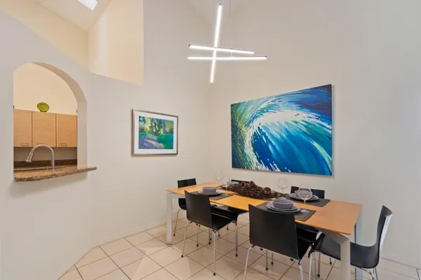 a view of a workspace with furniture