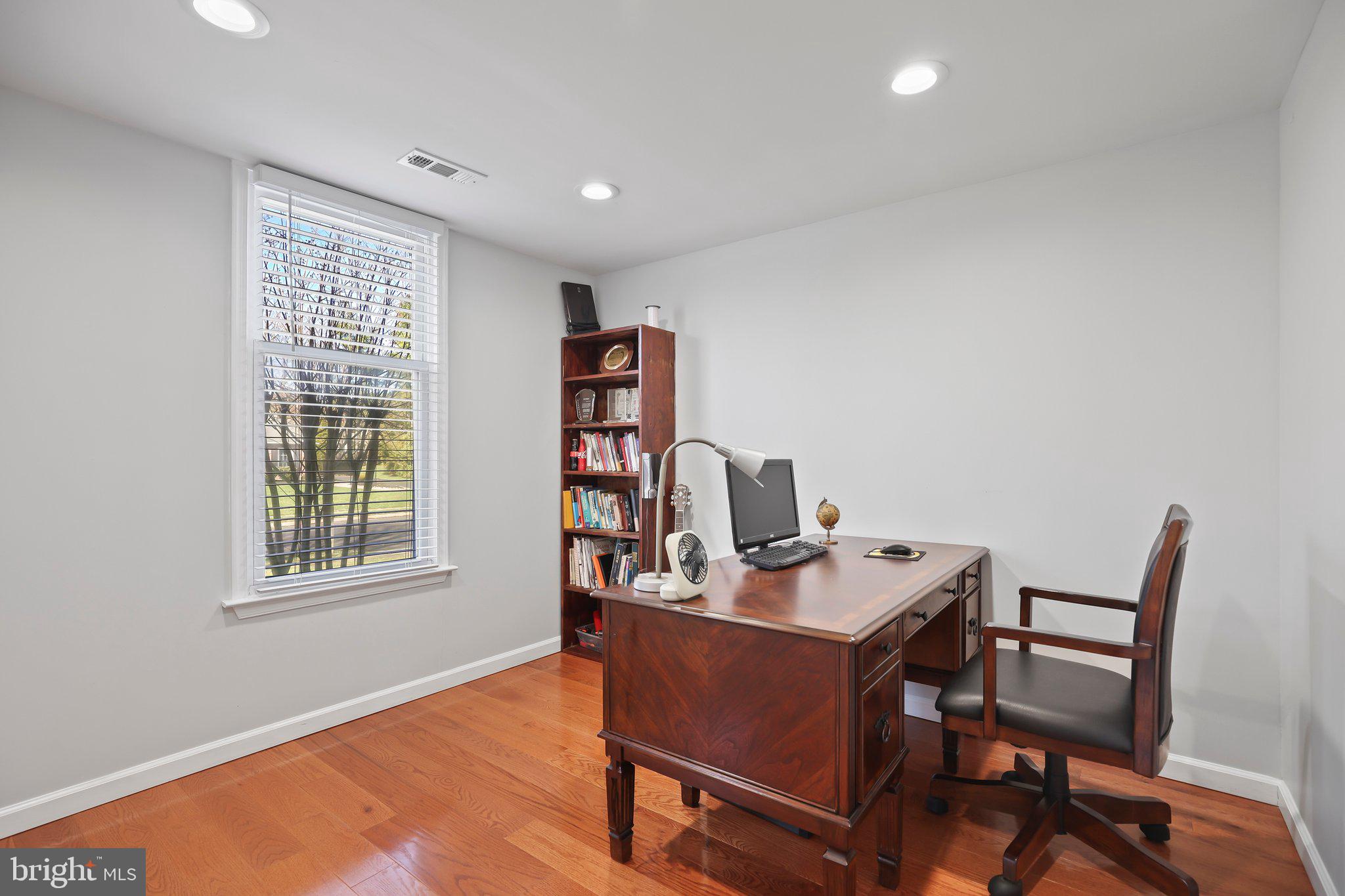 876 Henry Drive Yardley, PA 19067 - Photo 12 of 65 a view of a workspace with furniture and a window