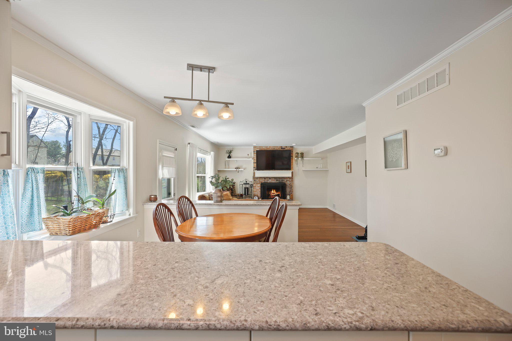 876 Henry Drive Yardley, PA 19067 - Photo 15 of 65 a view of a living room and kitchen