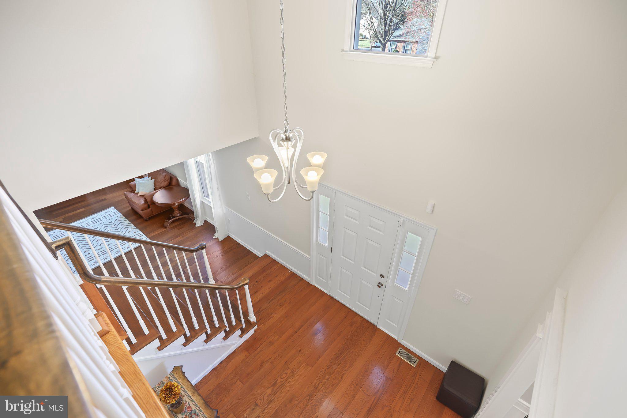 876 Henry Drive Yardley, PA 19067 - Photo 22 of 65 a view of entryway and hall with wooden floor