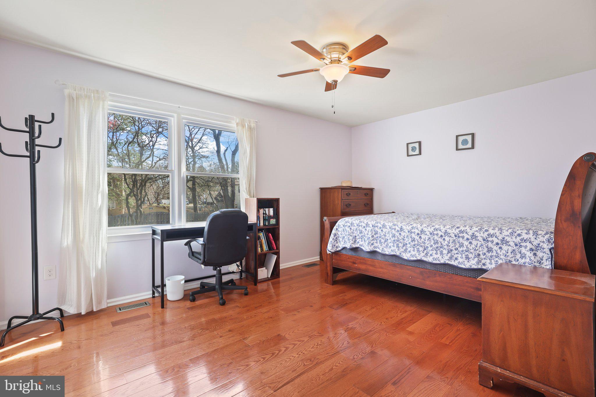 876 Henry Drive Yardley, PA 19067 - Photo 31 of 65 a bedroom with a bed and a window