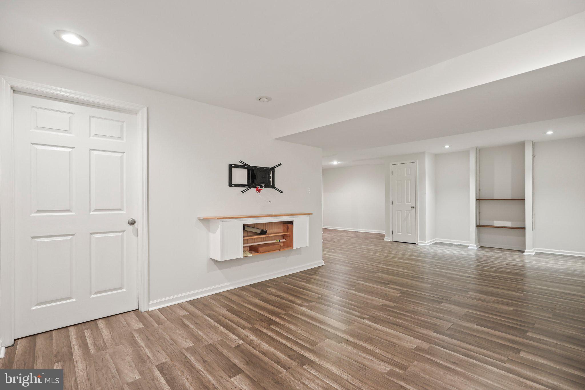 876 Henry Drive Yardley, PA 19067 - Photo 36 of 65 a view of empty room with wooden floor