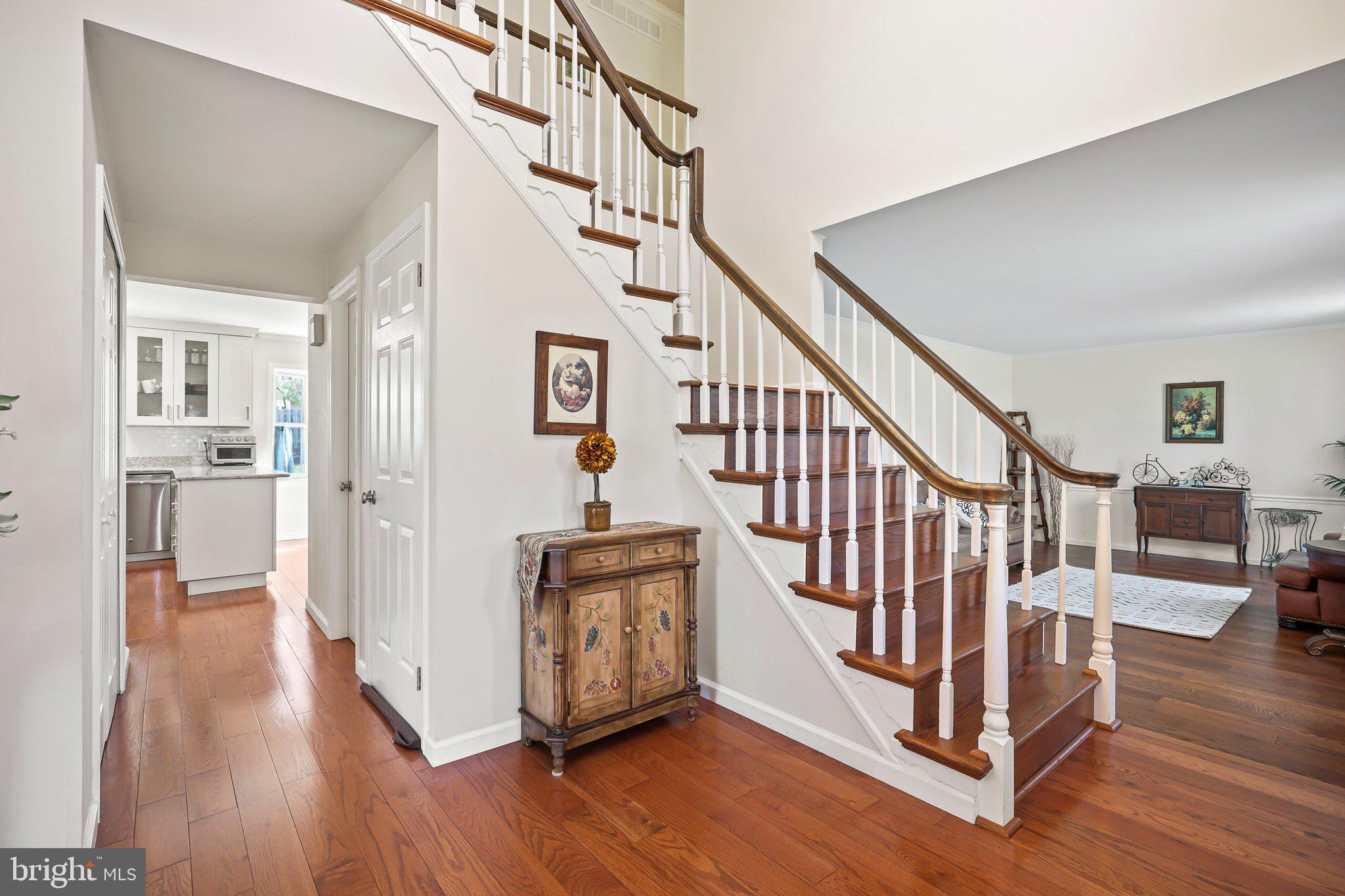 876 Henry Drive Yardley, PA 19067 - Photo 4 of 65 a view of entryway and hall with wooden floor