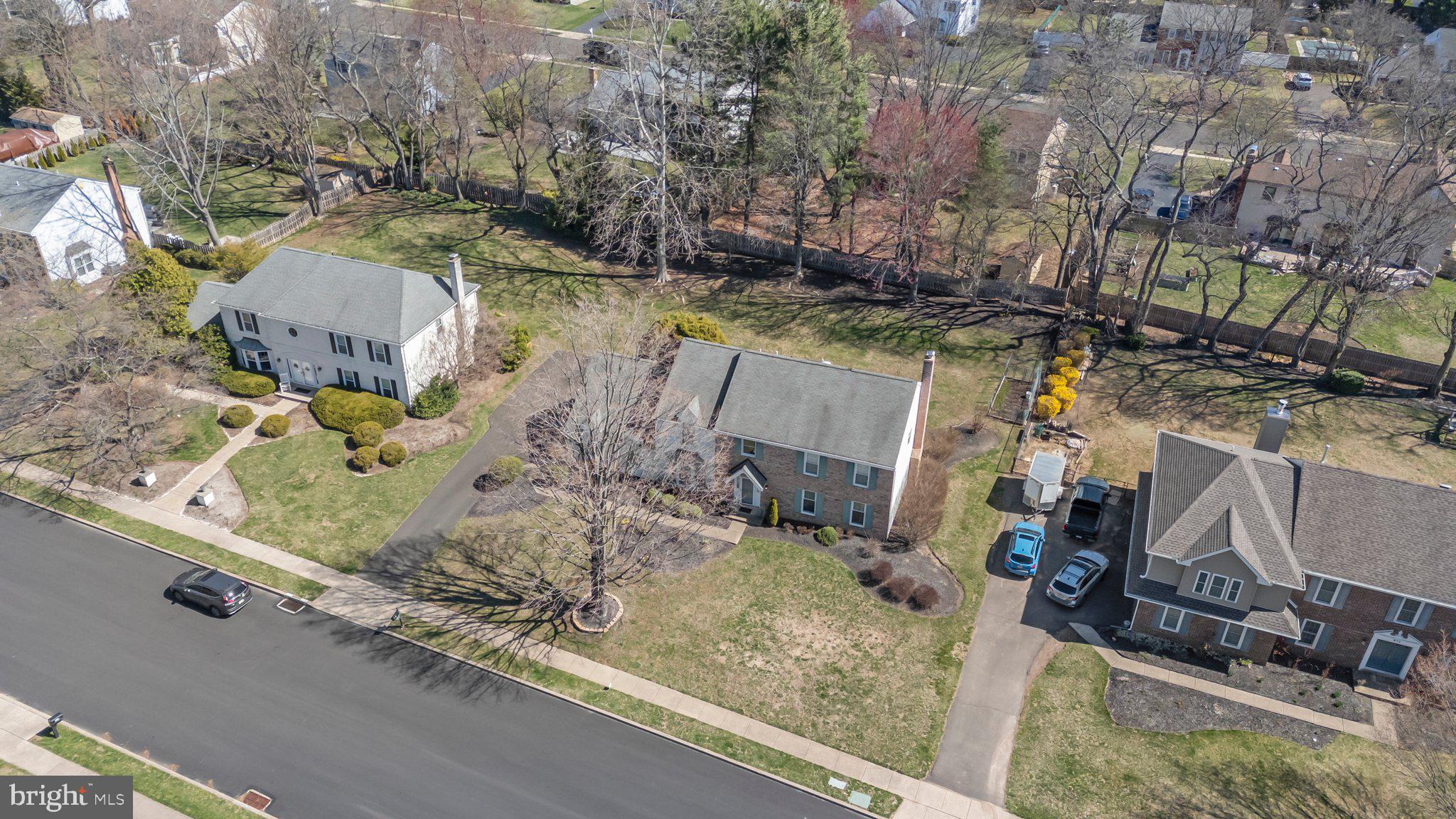876 Henry Drive Yardley, PA 19067 - Photo 52 of 65 a view of a house with a yard