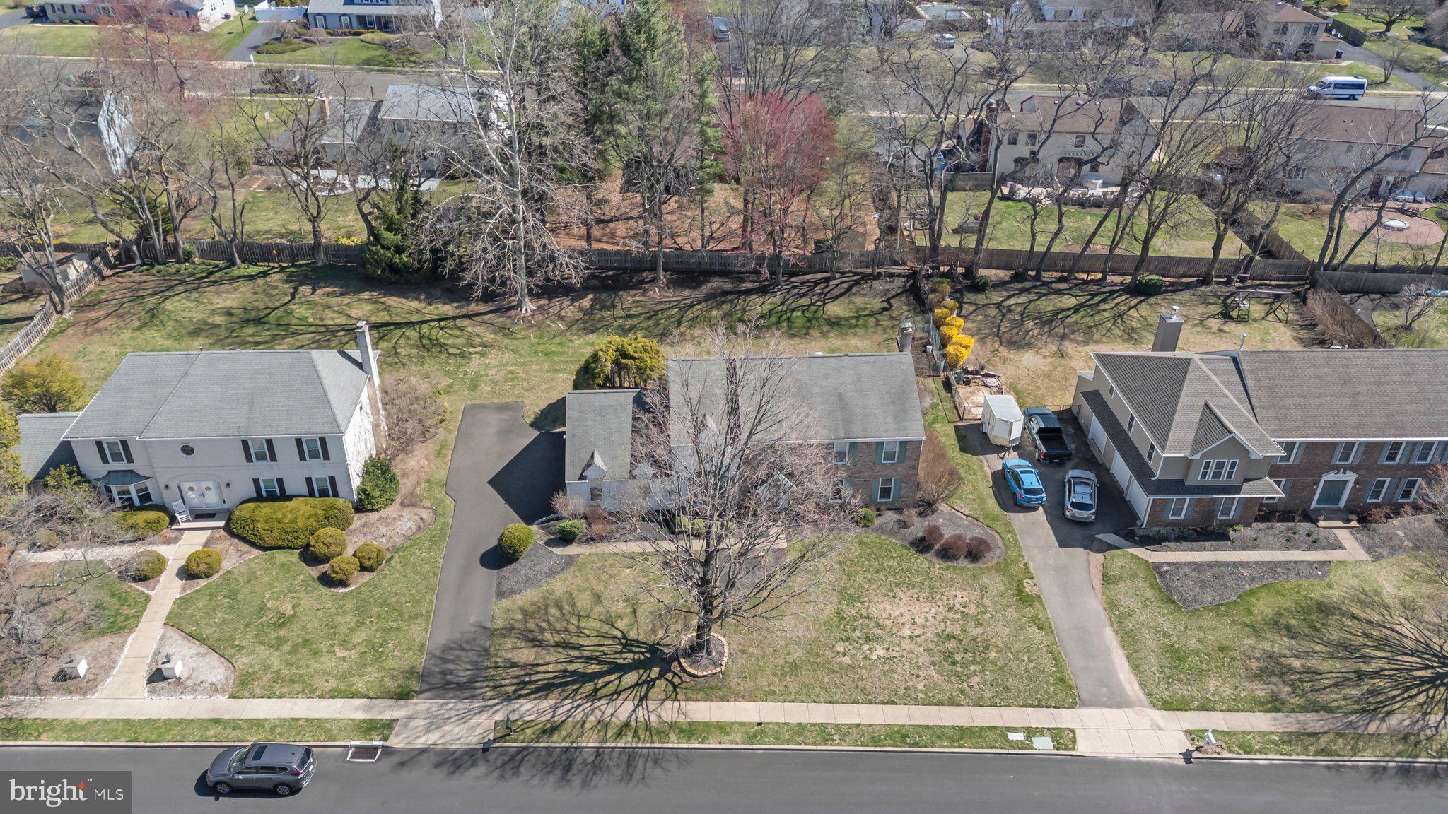 876 Henry Drive Yardley, PA 19067 - Photo 53 of 65 an aerial view of a house with a yard basket ball court