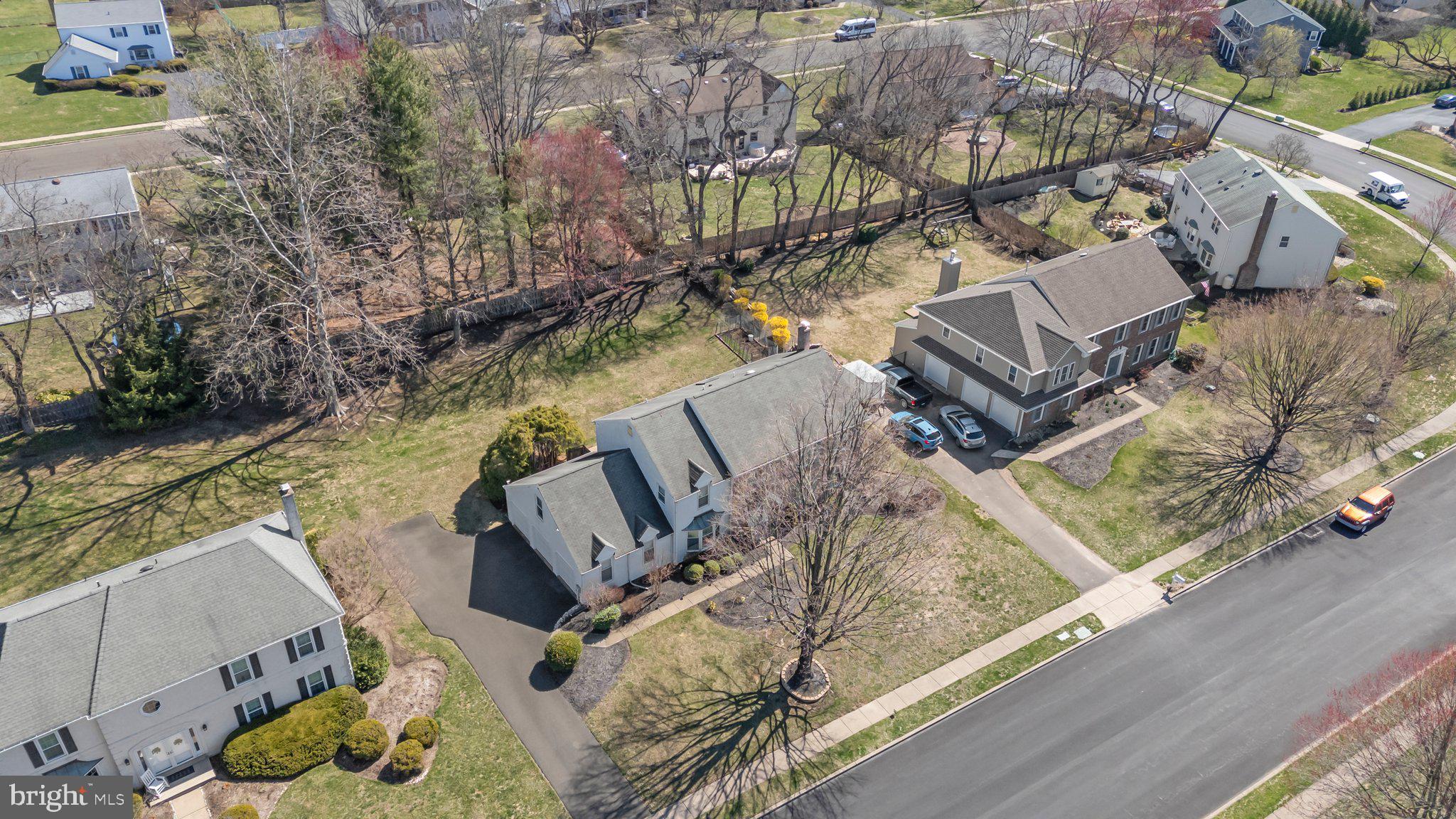 876 Henry Drive Yardley, PA 19067 - Photo 55 of 65 a view of roof deck with chairs and wooden fence