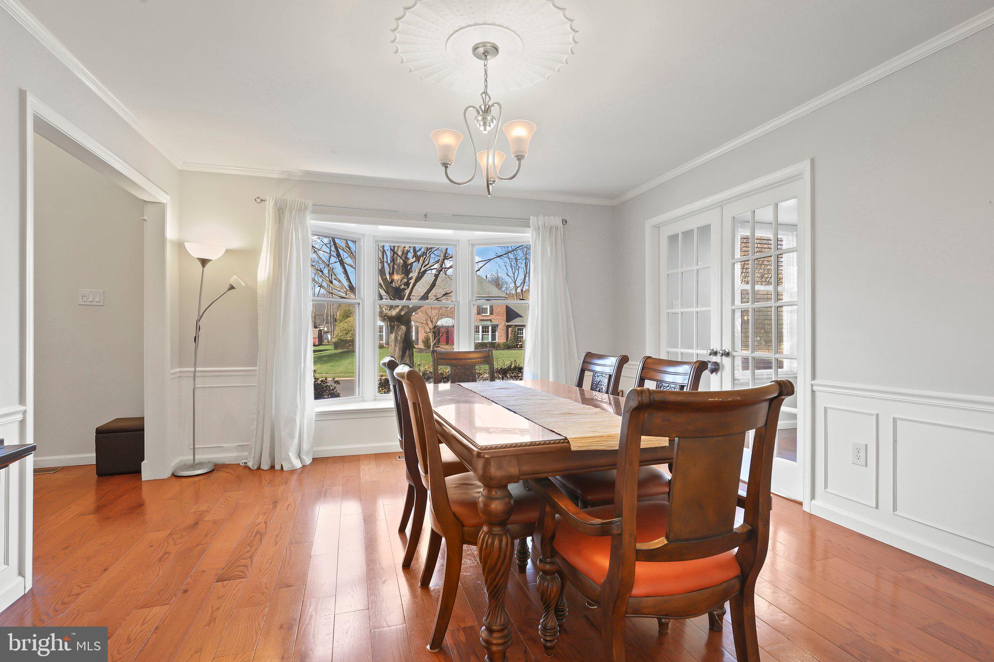 876 Henry Drive Yardley, PA 19067 - Photo 10 of 65 a view of a dining room with furniture window and wooden floor