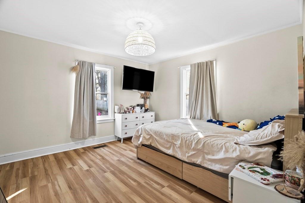 601 Juniper Avenue Dalton, GA 30721 - Photo 13 of 18 a bedroom with bed and flat screen tv