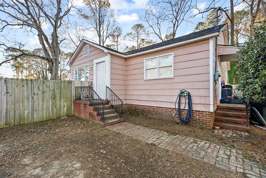 601 Juniper Avenue Dalton, GA 30721 - Photo 4 of 18 a view of a house with a yard and a tree