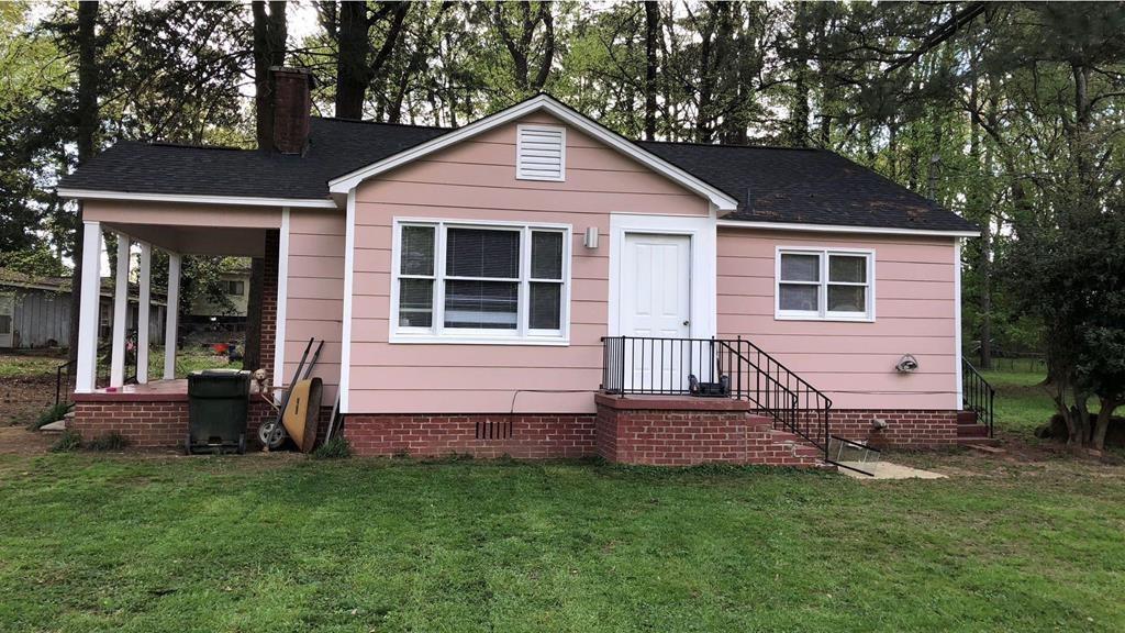 601 Juniper Avenue Dalton, GA 30721 - Photo 5 of 18 a view of a house with a yard