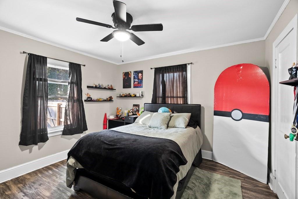 601 Juniper Avenue Dalton, GA 30721 - Photo 10 of 18 a bedroom with a bed dresser and a window