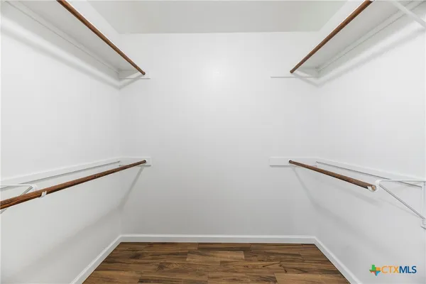 a view of a room with racks on the wall