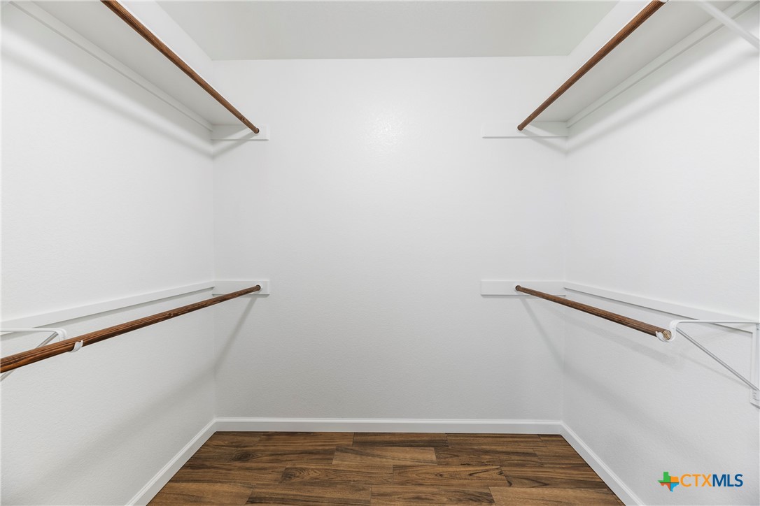 230 Plum Street Luling, TX 78648 - Photo 29 of 33 a view of a room with racks on the wall